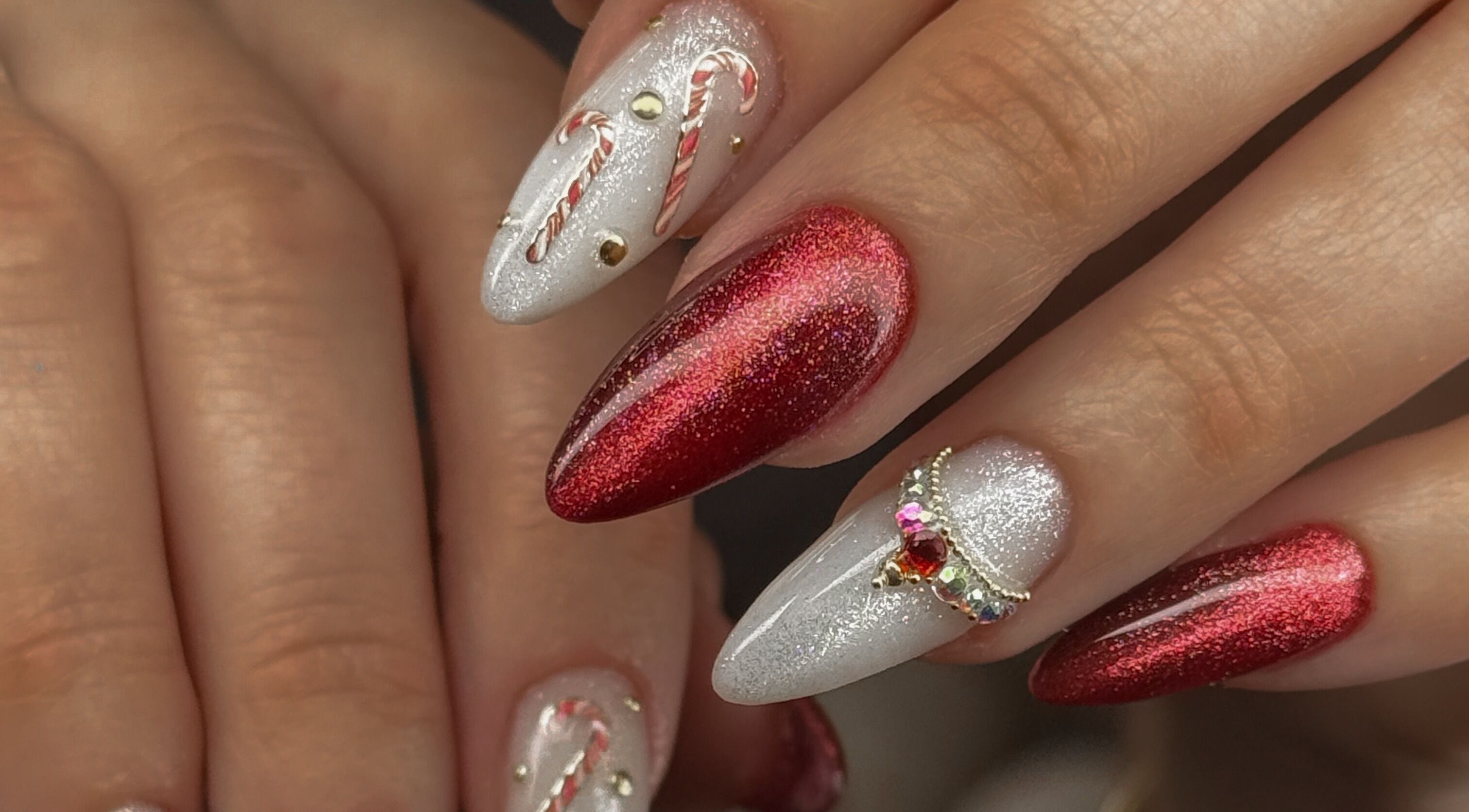 Elegant red and white holiday nail art at Katzby Nail Artistry, Canning Vale, Western Australia, AU.