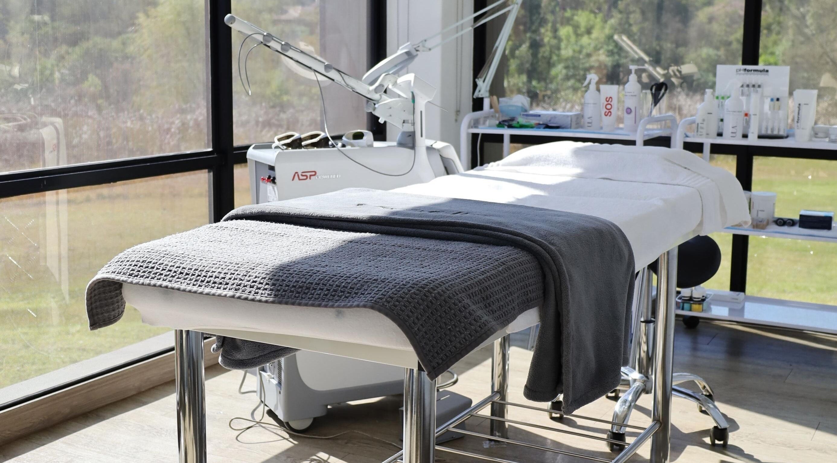 Spacious treatment room at NuSkinnovation Pretoria East (Pty) Ltd in Pretoria, Gauteng, ZA, featuring modern equipment.
