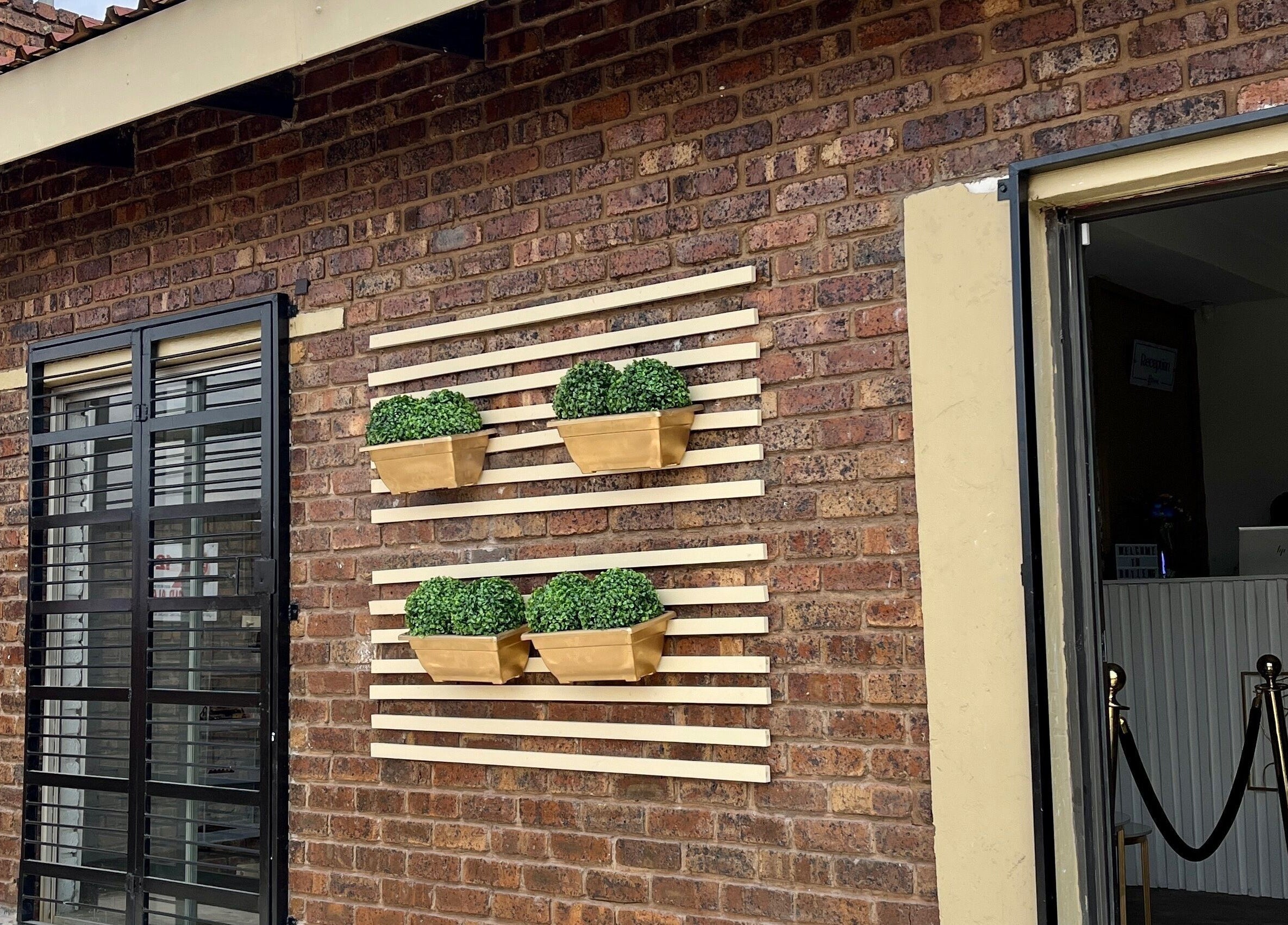 Brick facade with modern decor at Botleng Studio, Middelburg, Mpumalanga, ZA.