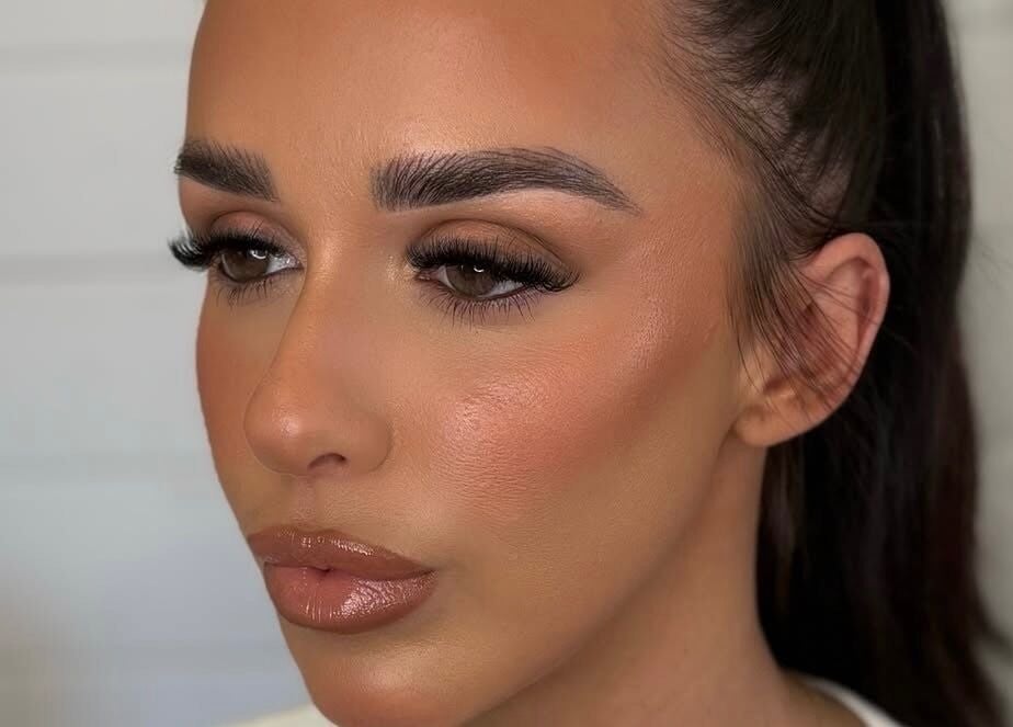 Close-up of glam makeup by Makeup by Lucy in Dundee, Scotland, GB. Highlighted cheeks and perfect lashes.