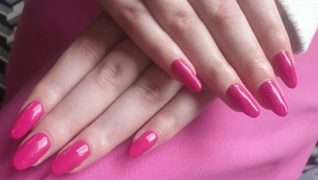 Pink manicured nails at OM Nail Design in Dublin, County Dublin, IE, showcasing expert nail artistry.
