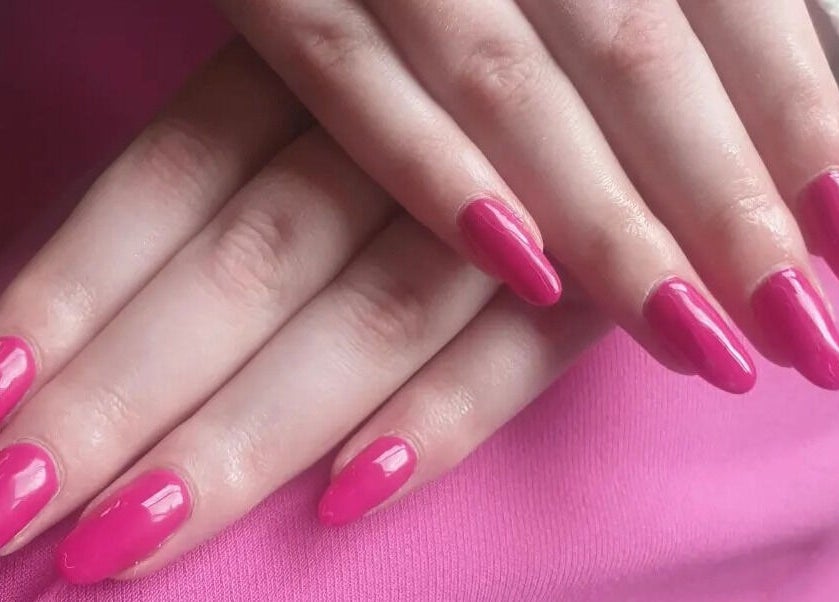 Pink manicured nails at OM Nail Design in Dublin, County Dublin, IE, showcasing expert nail artistry.