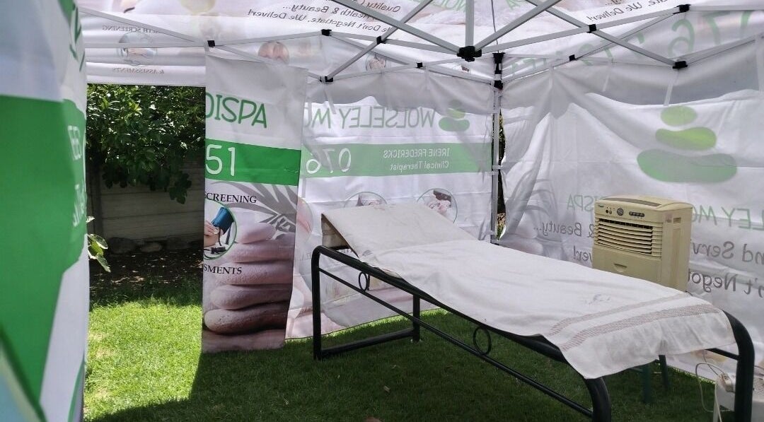 Relaxing space at Wolseley Mobile MediSpa, Wolseley, Western Cape, ZA, featuring a treatment bed under a canopy.