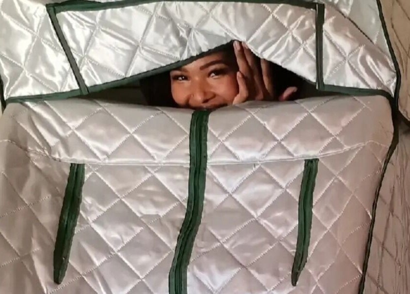 Woman enjoying portable sauna at Wolseley Mobile MediSpa in Wolseley, Western Cape, ZA.