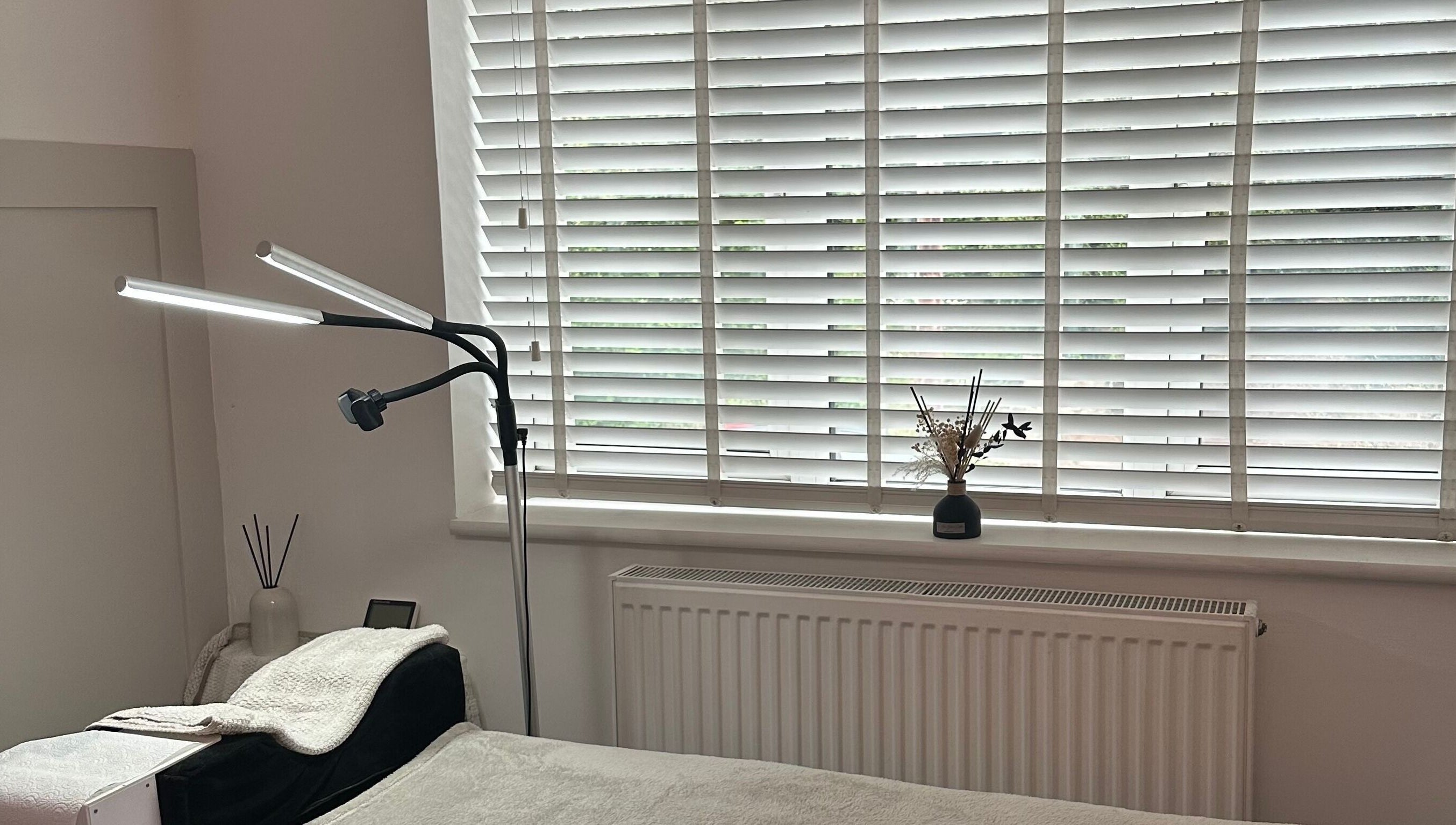 Cozy relaxation area in The Aura Cabin, Bobbing, England, GB with soothing decor and natural light.