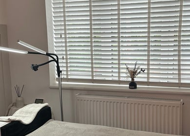 Cozy relaxation area in The Aura Cabin, Bobbing, England, GB with soothing decor and natural light.