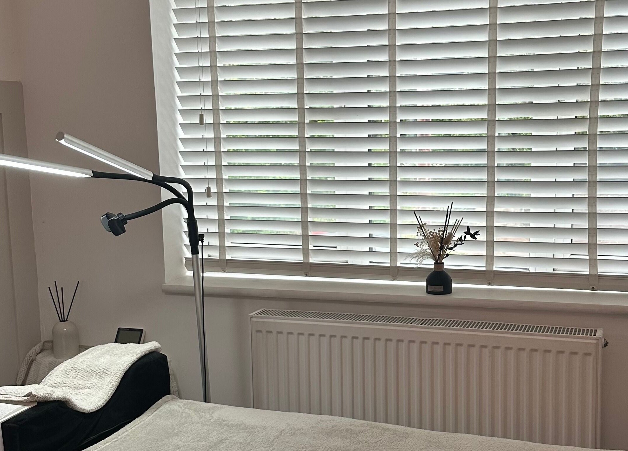 Cozy relaxation area in The Aura Cabin, Bobbing, England, GB with soothing decor and natural light.