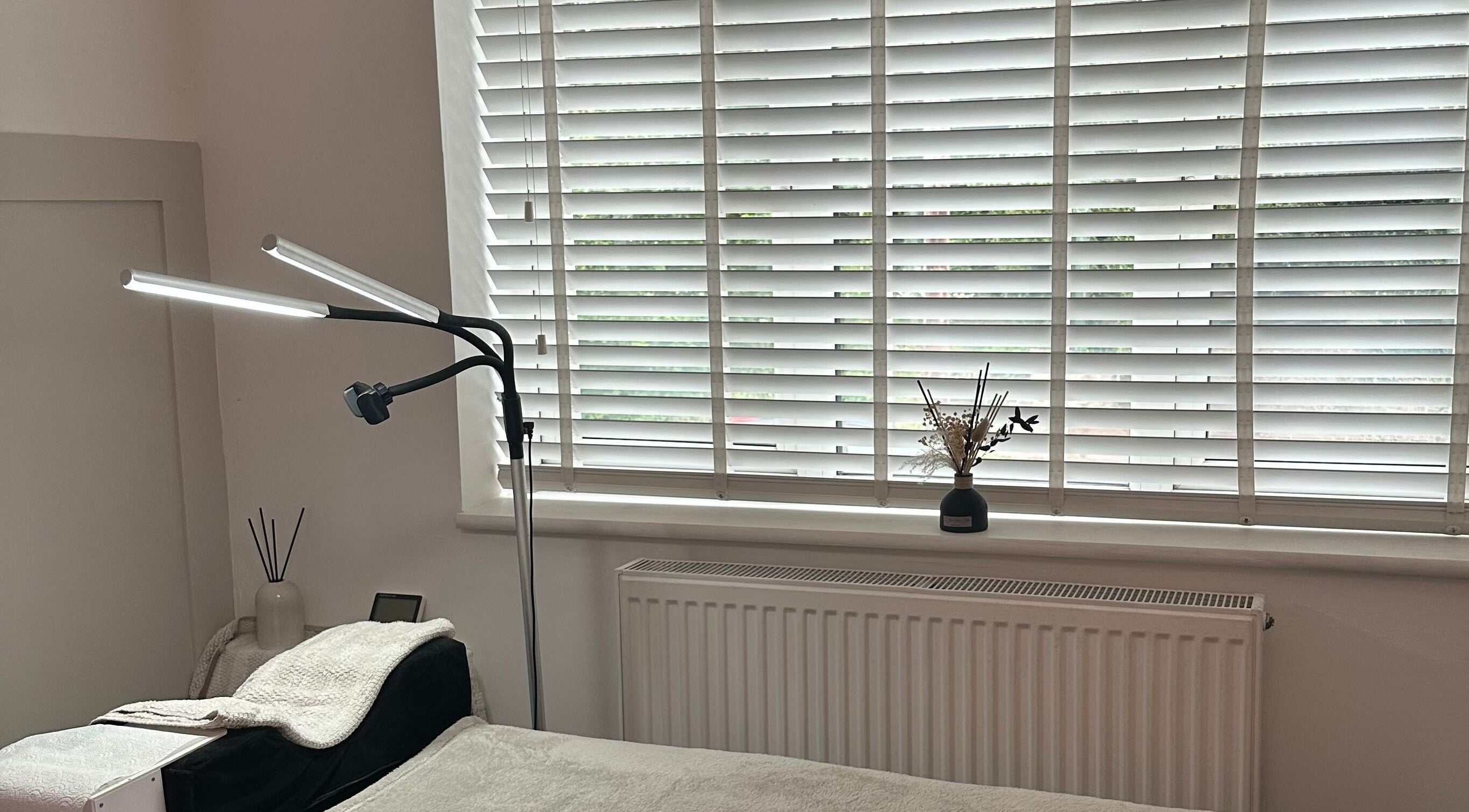Cozy relaxation area in The Aura Cabin, Bobbing, England, GB with soothing decor and natural light.