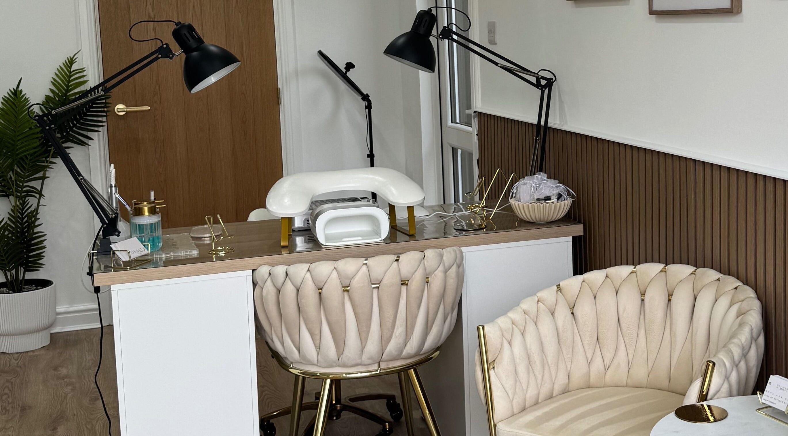 Chic nail station at Defined Studio in Bowers Gifford, England, GB with plush seating and modern decor.