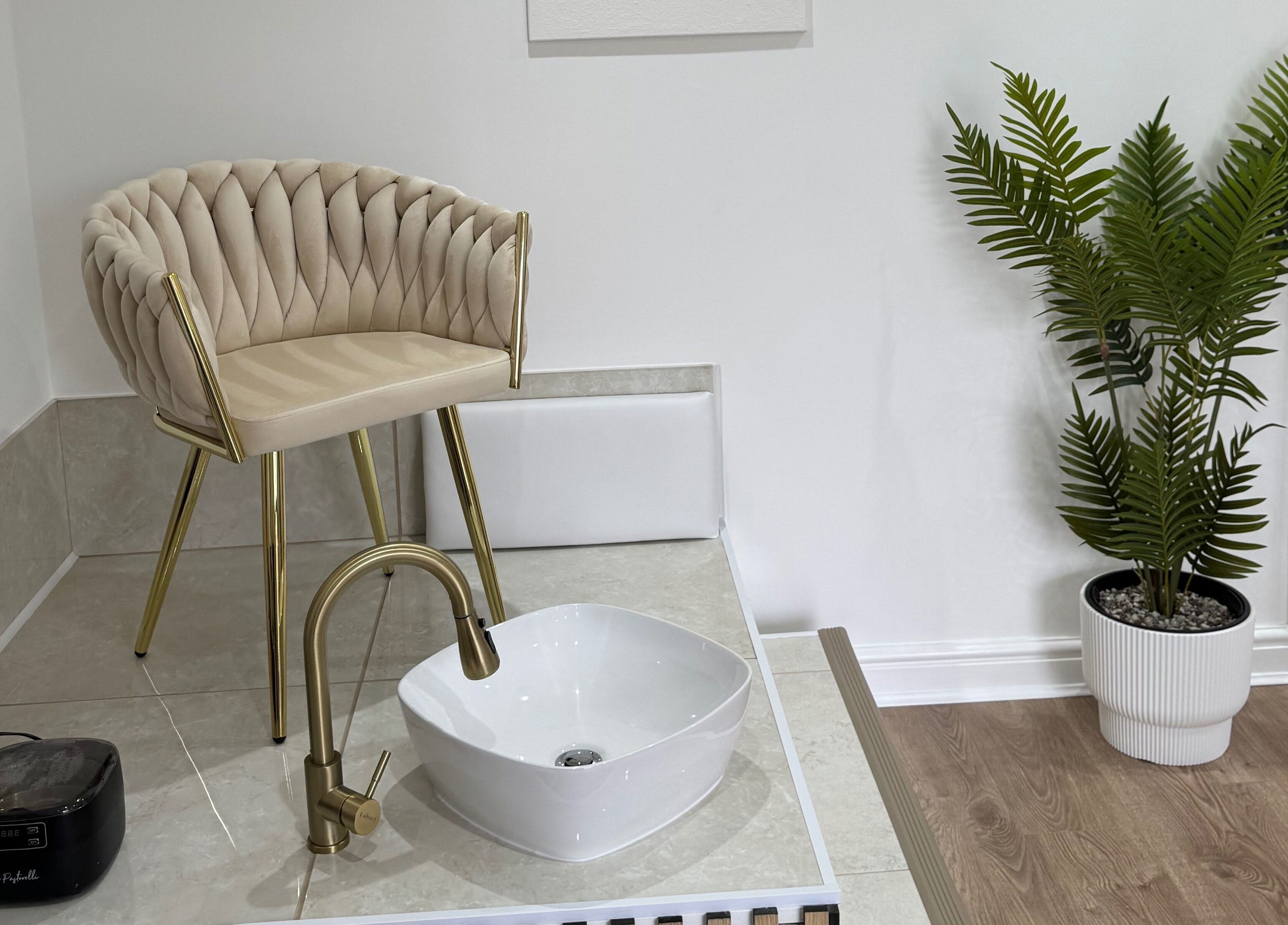 Luxurious pedicure station at Defined Studio, Bowers Gifford, England, GB. Features a chic chair and modern decor.