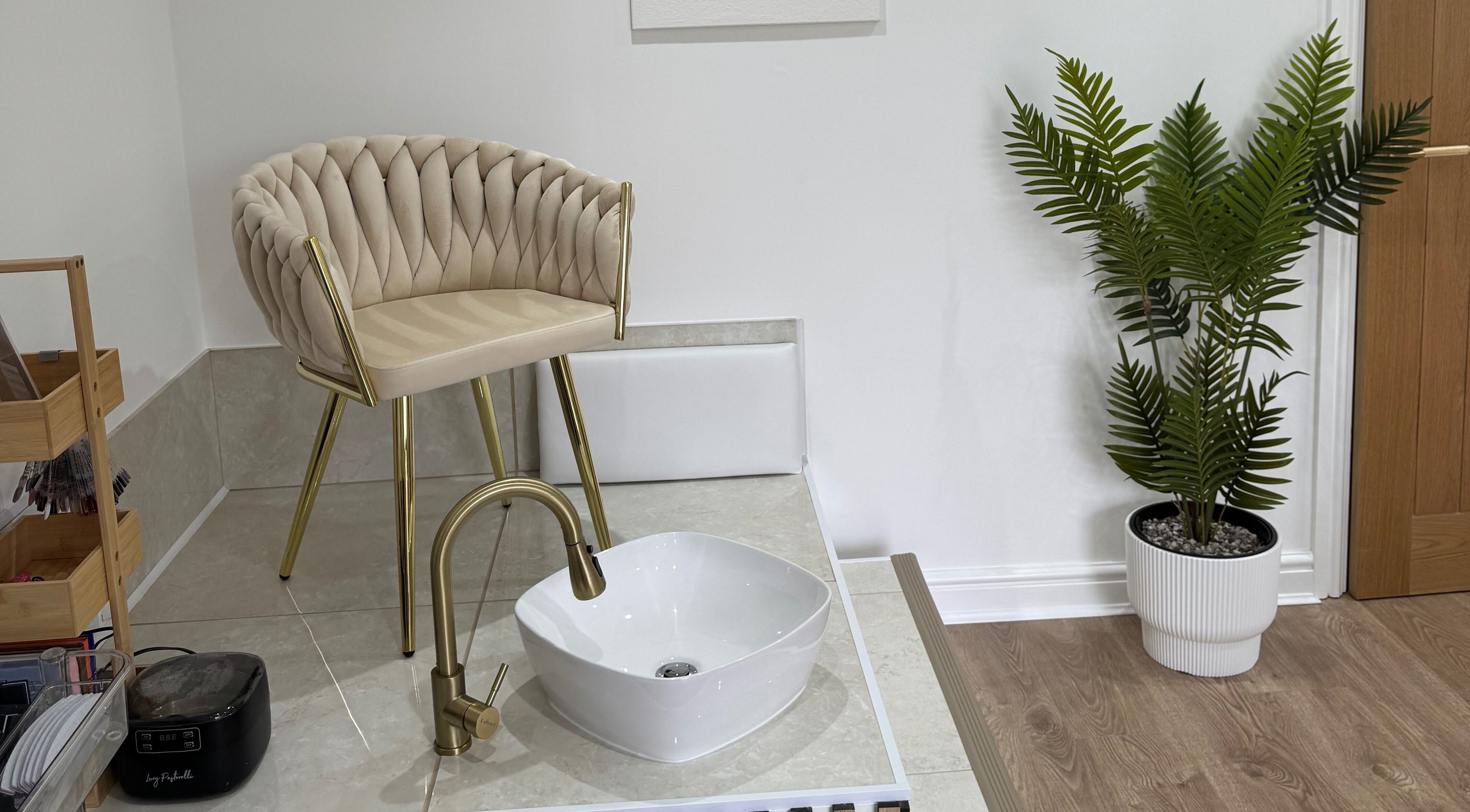 Luxurious pedicure station at Defined Studio, Bowers Gifford, England, GB. Features a chic chair and modern decor.