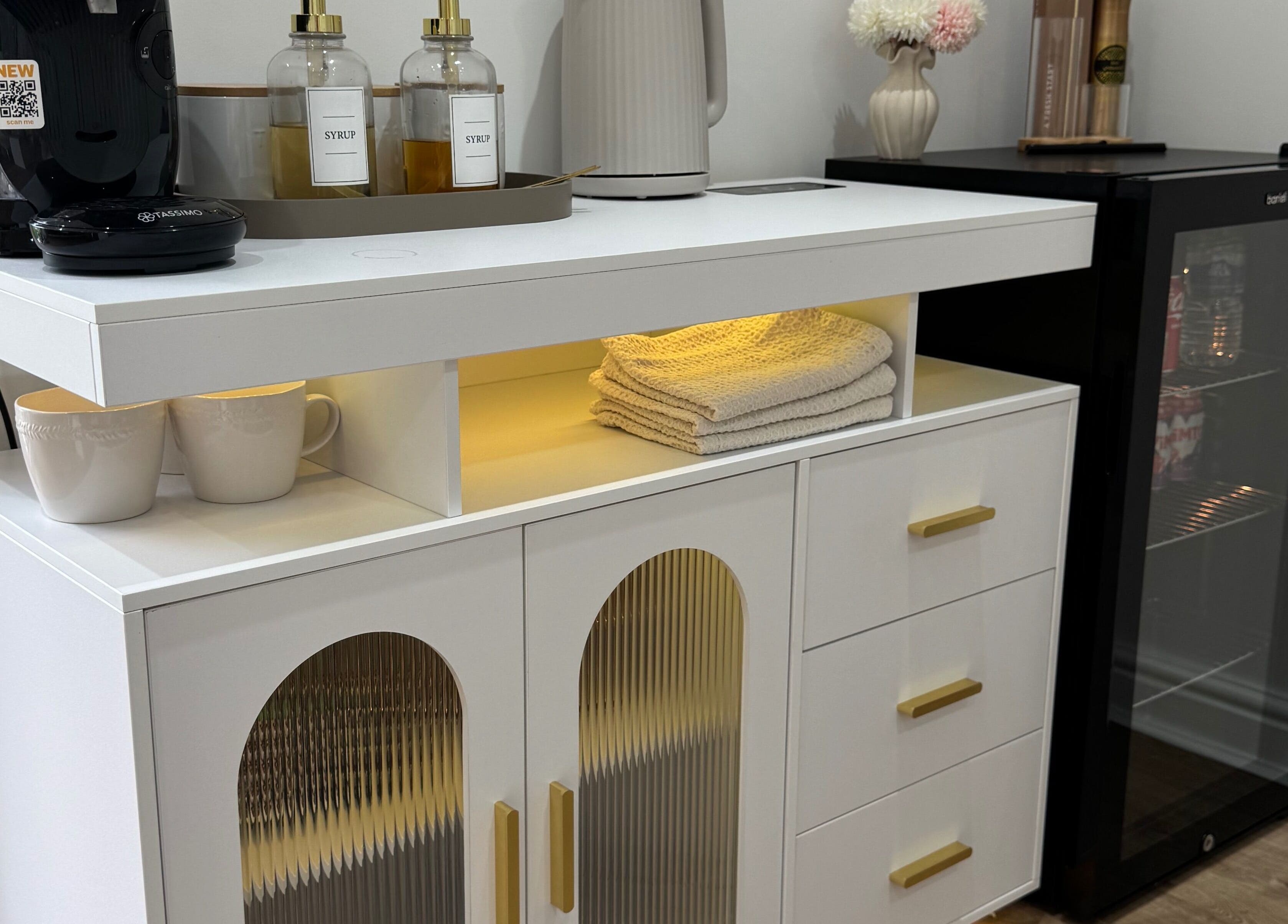 Defined Studio refreshment area in Bowers Gifford, England, featuring coffee and towels.