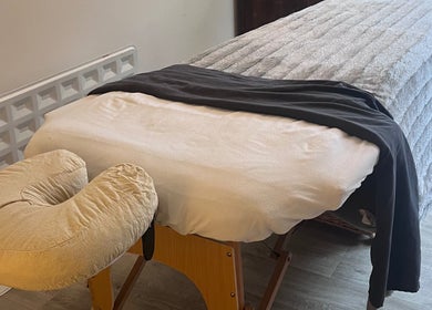Massage table setup at Woodview Holistic Therapies, Sheffield, England, GB, offering relaxation.