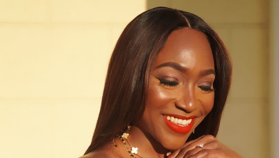 Smiling woman with flawless makeup at Halisbeautytouch, Port of Spain, Port of Spain Corporation, TT.