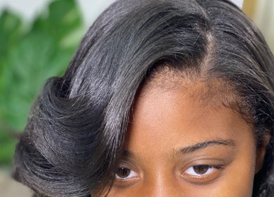 Close-up of stylish, shiny hairstyle from Halisbeautytouch in Port of Spain, Port of Spain Corporation, TT.