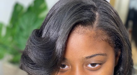 Close-up of stylish, shiny hairstyle from Halisbeautytouch in Port of Spain, Port of Spain Corporation, TT.