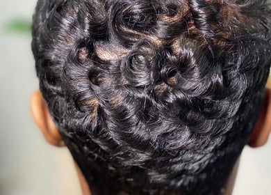 Close-up of elegant curled hairstyle at Halisbeautytouch, Port of Spain, Port of Spain Corporation, TT.