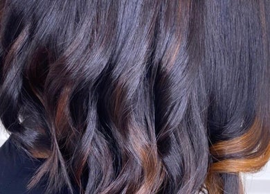 Stylish wavy hairstyle at Halisbeautytouch in Port of Spain, Port of Spain Corporation, TT. Perfect for a chic look.