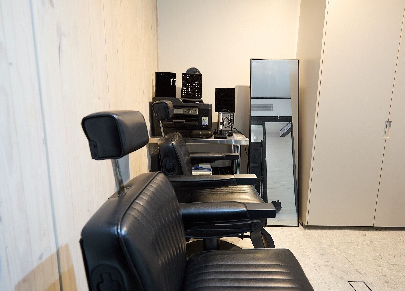 Modern salon chairs at Ouchie, Manly, New South Wales, AU, paired with a sleek mirror setup.