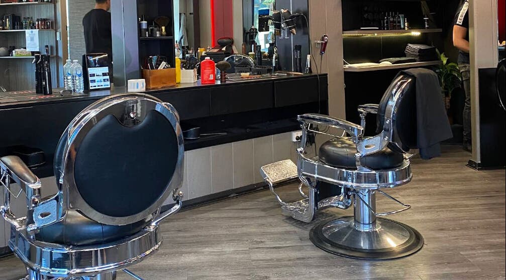 Elegant salon chairs inside KINGZMAN, Cammeray, NSW, AU, showcasing luxury and modern design.