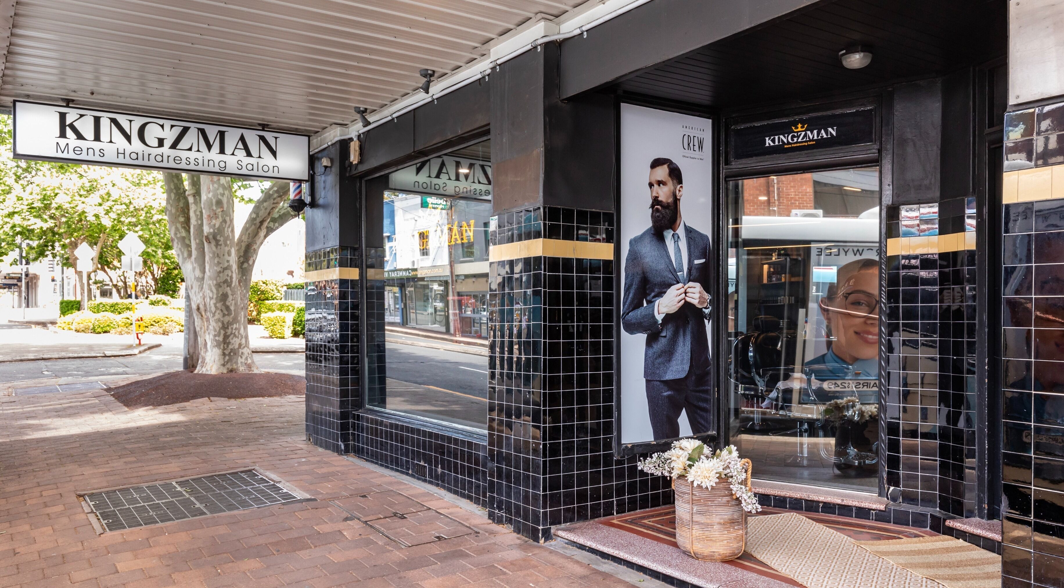 KINGZMAN salon facade in Cammeray, NSW, AU, showcasing modern design and professional appeal.