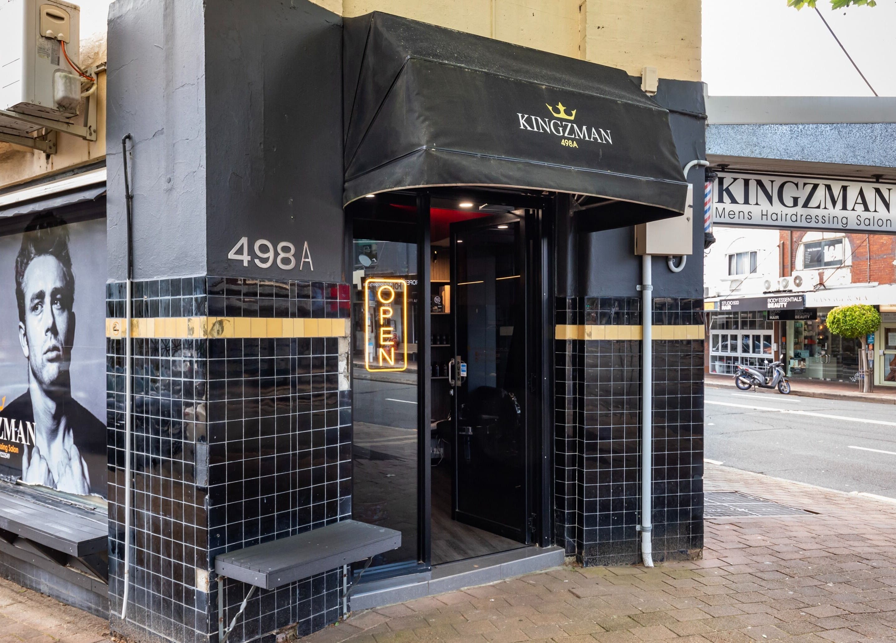Front view of KINGZMAN men's hairdressing salon at Cammeray, NSW, AU, showcasing its elegant entrance.