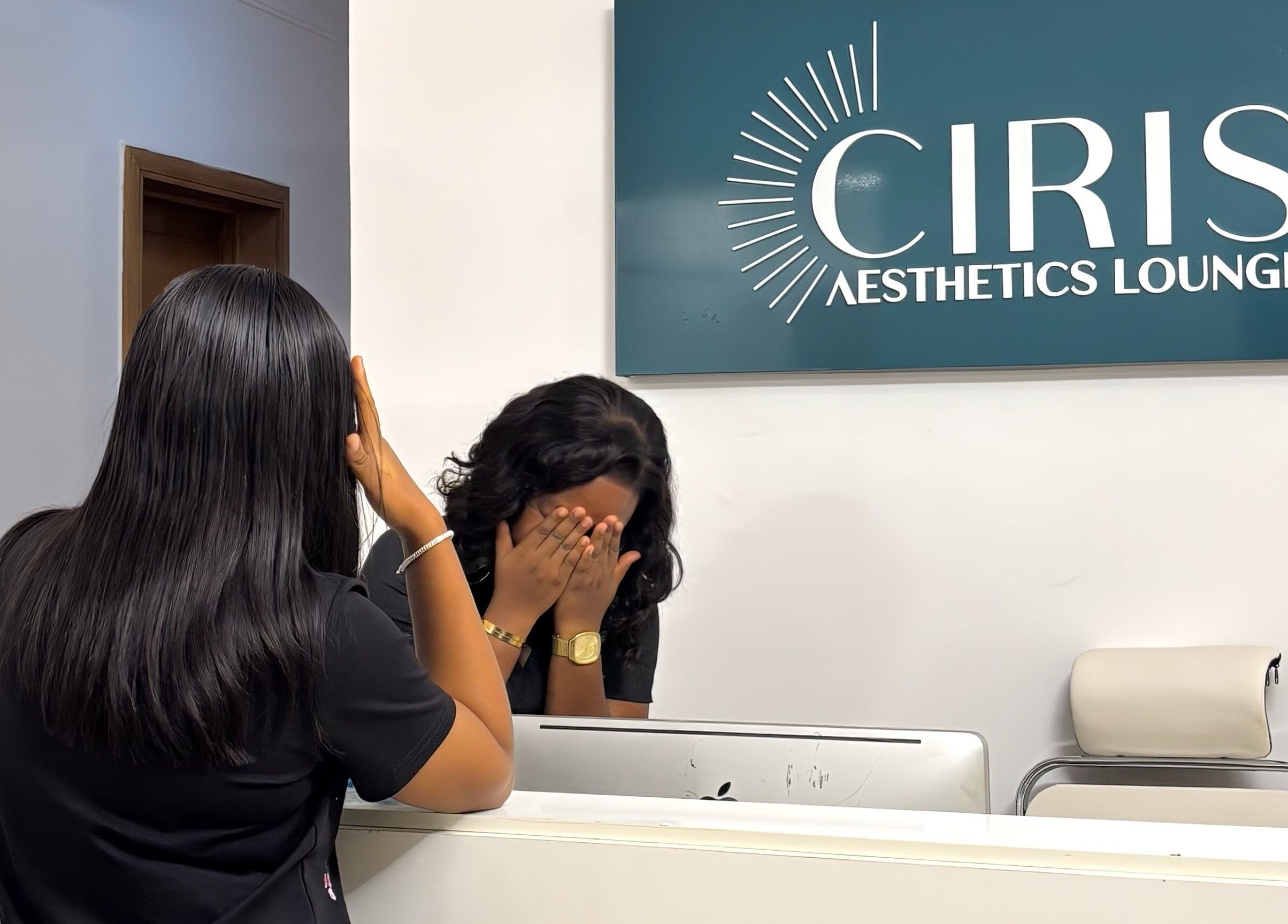 Reception at CIRIS Aesthetics Lounge, Lagos, Lagos, NG, showcasing friendly staff interaction.