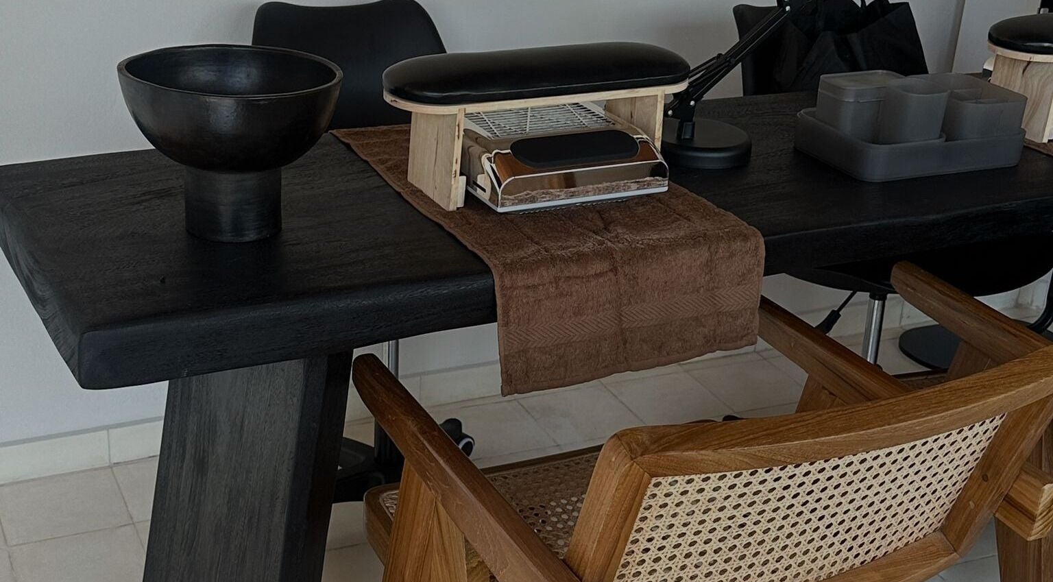 Elegant nail station at Studio SAMĀ Nails & Coffee [Nyuh Kuning], Bali, Bali, ID with modern decor.