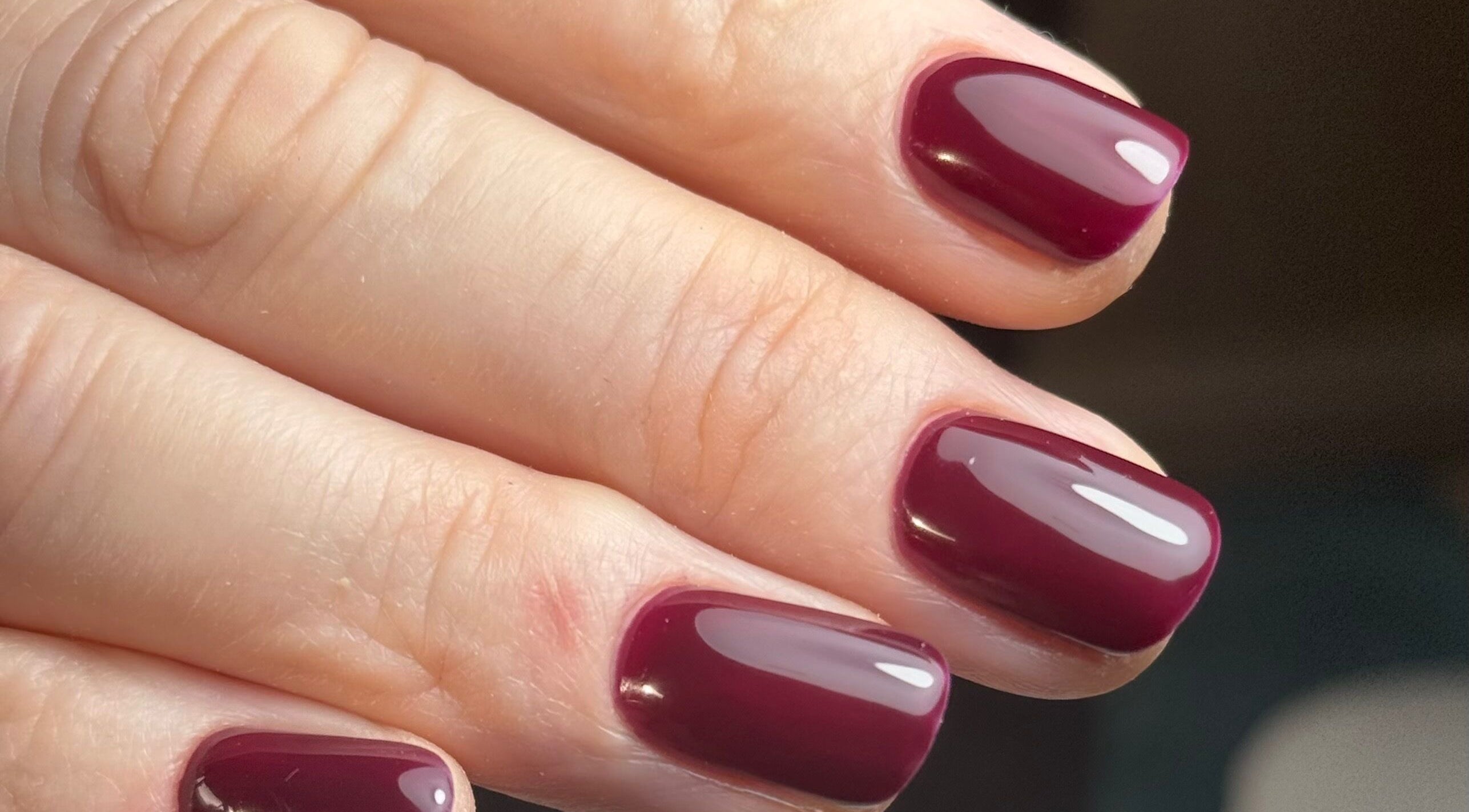 Crimson manicure at B By Sam, Carlisle, England, GB. Expertly done nail art for ultimate beauty.