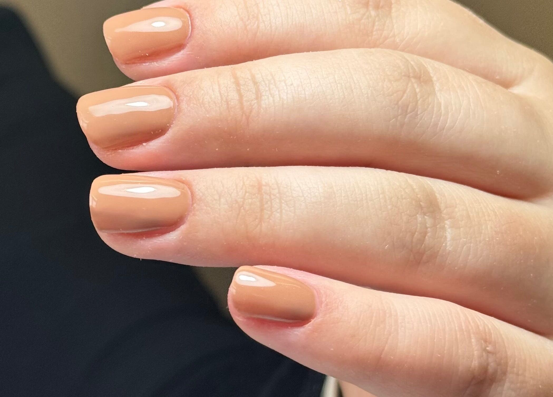 Close-up of manicured nails with nude polish at B By Sam, Carlisle, England, GB.
