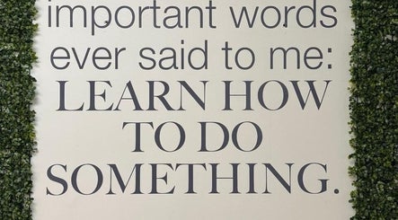 Greenery decor with motivational quote at Dermanation South Africa, Sandton, Gauteng, ZA.