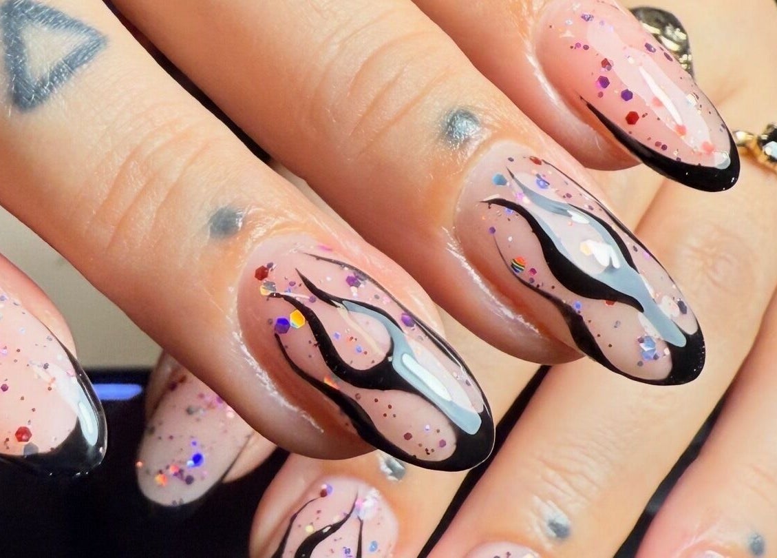 Stylish flame nail art with glitter at Lady Luck Nails Worthing, Worthing, West Sussex, GB.