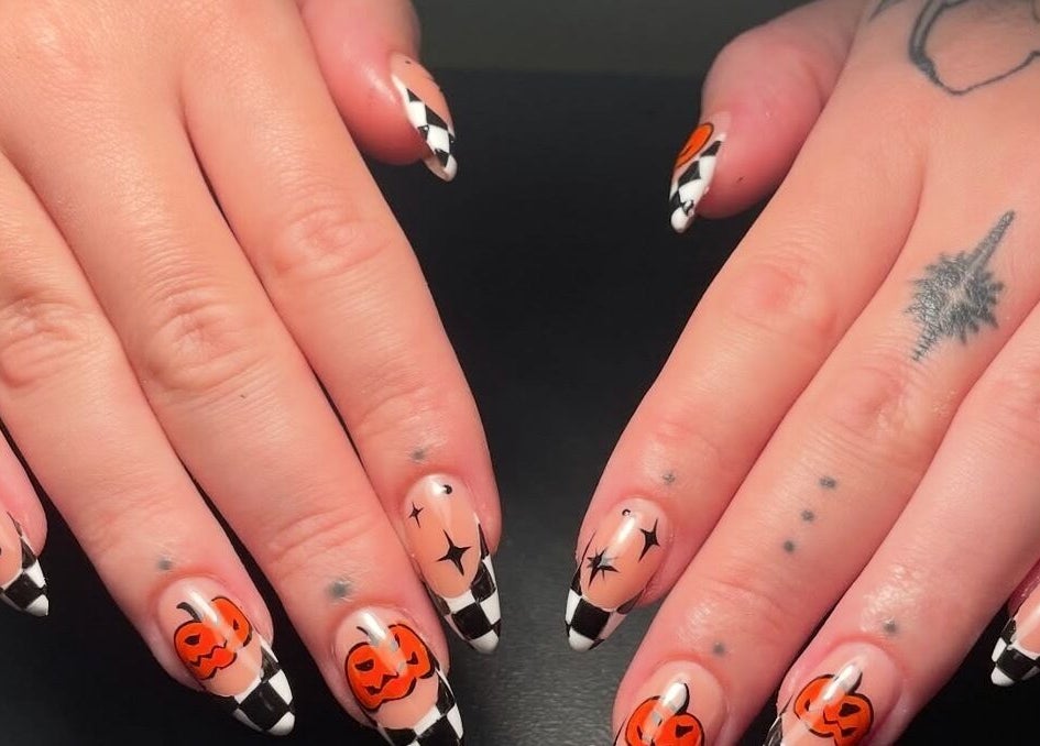 Stylish Halloween-themed nails at Lady Luck Nails Worthing, West Sussex, GB. Perfect for festive flair.