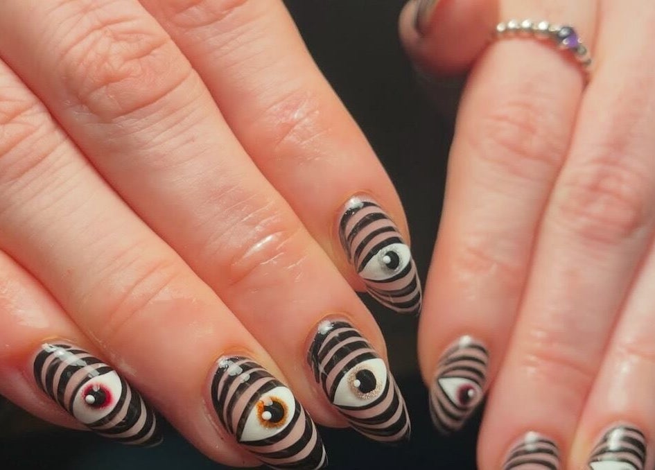 Unique eye design nail art at Lady Luck Nails Worthing, West Sussex, GB.