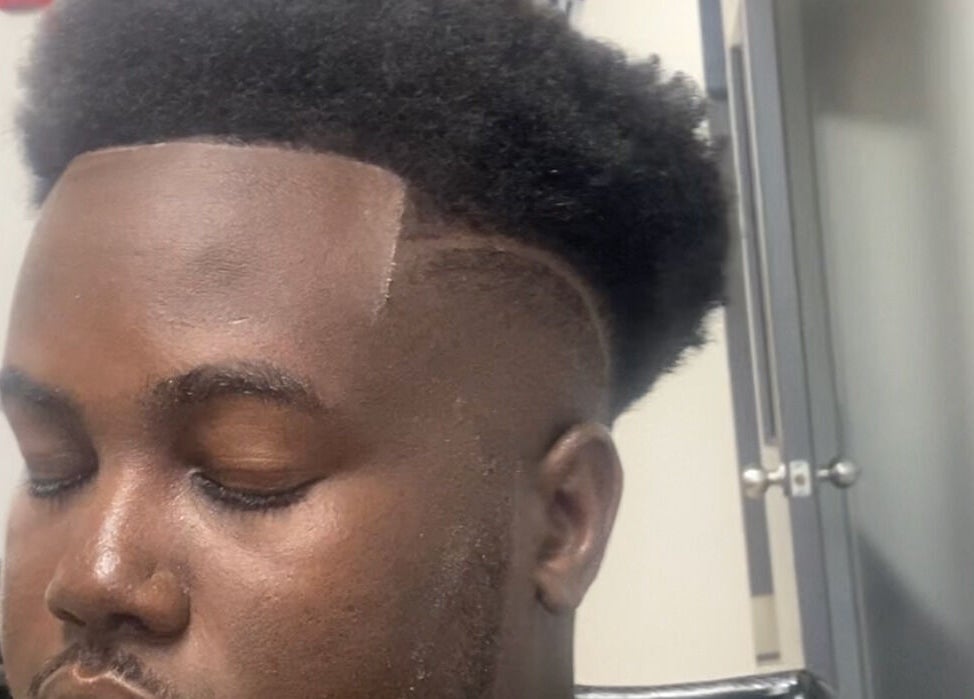 Close-up of a man's fresh haircut at Jesus in da Cut ™️, Berrien Springs, Michigan, US.