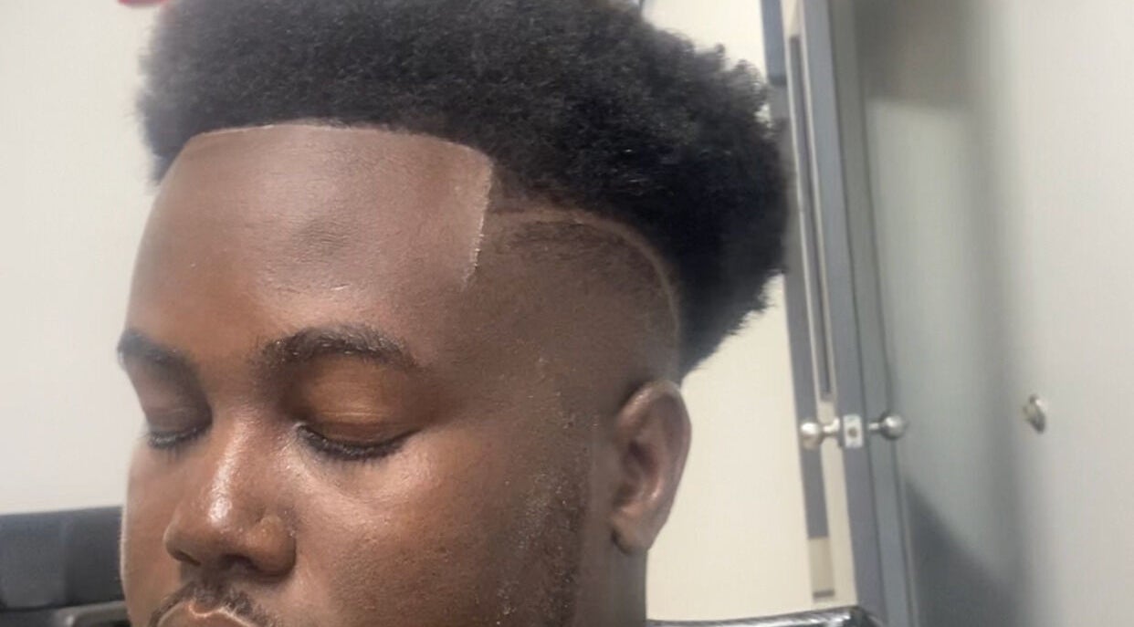 Close-up of a man's fresh haircut at Jesus in da Cut ™️, Berrien Springs, Michigan, US.