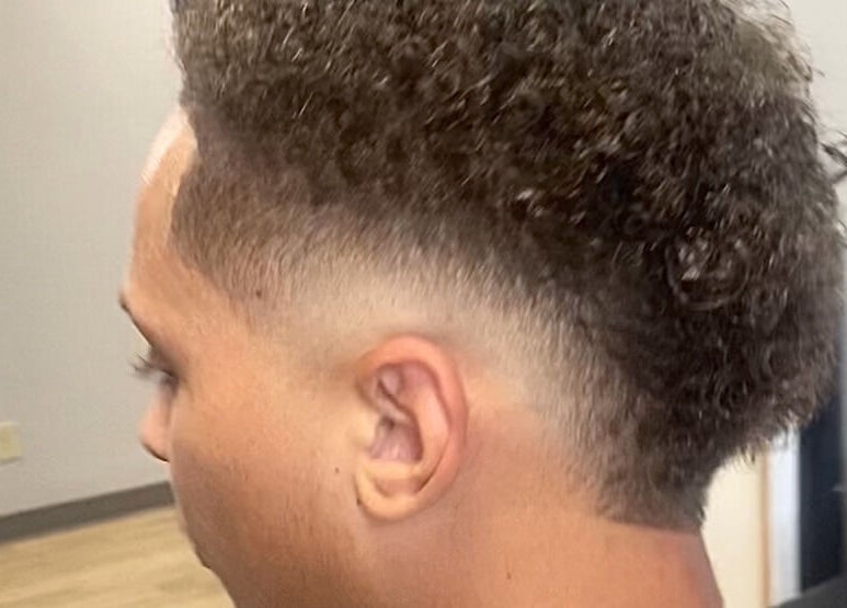 Fresh haircut with a stylish fade at Jesus in da Cut ™️, Berrien Springs, Michigan, US.