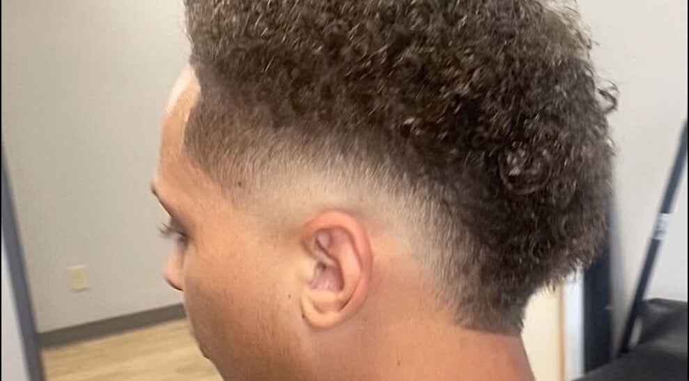 Fresh haircut with a stylish fade at Jesus in da Cut ™️, Berrien Springs, Michigan, US.