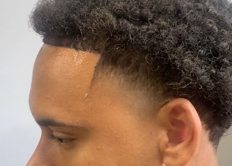 Close-up of a professional fade haircut at Jesus in da Cut ™️, Berrien Springs, Michigan, US.