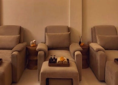 Relaxing lounge chairs at Hutan Spa, Bali, Bali, ID promise a tranquil escape for wellness seekers.