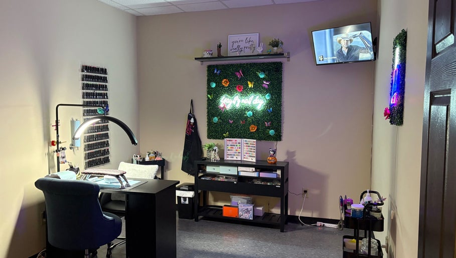 Nail station at The Modern Beauty Lounge, LLC, Inman, South Carolina, US, with decor and seating.