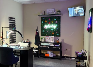 Nail station at The Modern Beauty Lounge, LLC, Inman, South Carolina, US, with decor and seating.