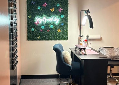 Nail station at The Modern Beauty Lounge, LLC in Inman, South Carolina, US with elegant decor and lighting.