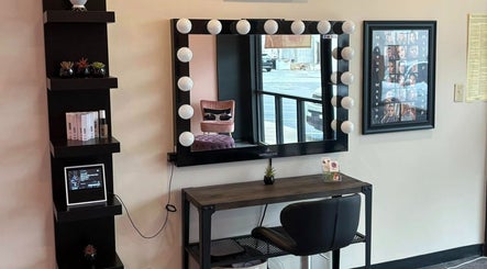 Elegant beauty station at The Modern Beauty Lounge, LLC in Inman, South Carolina, US with mirror lights.
