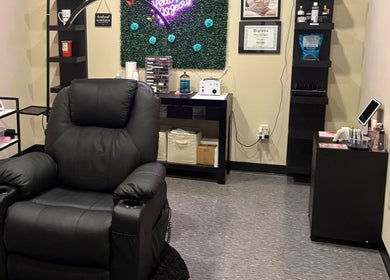 Cozy treatment room at The Modern Beauty Lounge, LLC in Inman, South Carolina, US with a plush reclining chair.