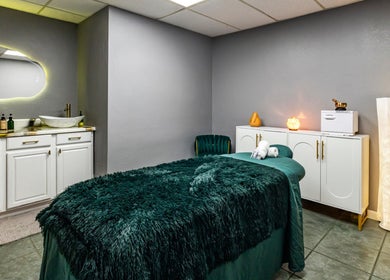 Luxurious massage room at The Shape Spa (Ft. Lauderdale) in Fort Lauderdale, Florida, US, featuring elegant decor.