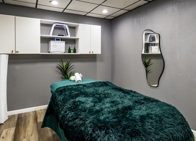 Cozy massage room at The Shape Spa (Ft. Lauderdale), Fort Lauderdale, Florida, US, with teal decor.