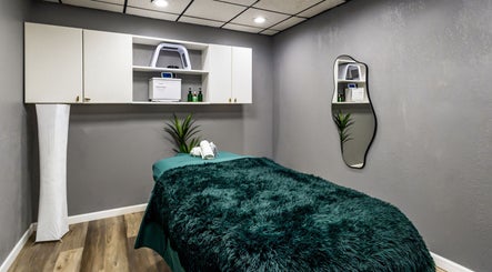 Cozy massage room at The Shape Spa (Ft. Lauderdale), Fort Lauderdale, Florida, US, with teal decor.