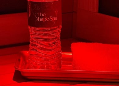 The Shape Spa (Ft. Lauderdale) water bottle and towel at Fort Lauderdale, Florida, US, offering relaxation.