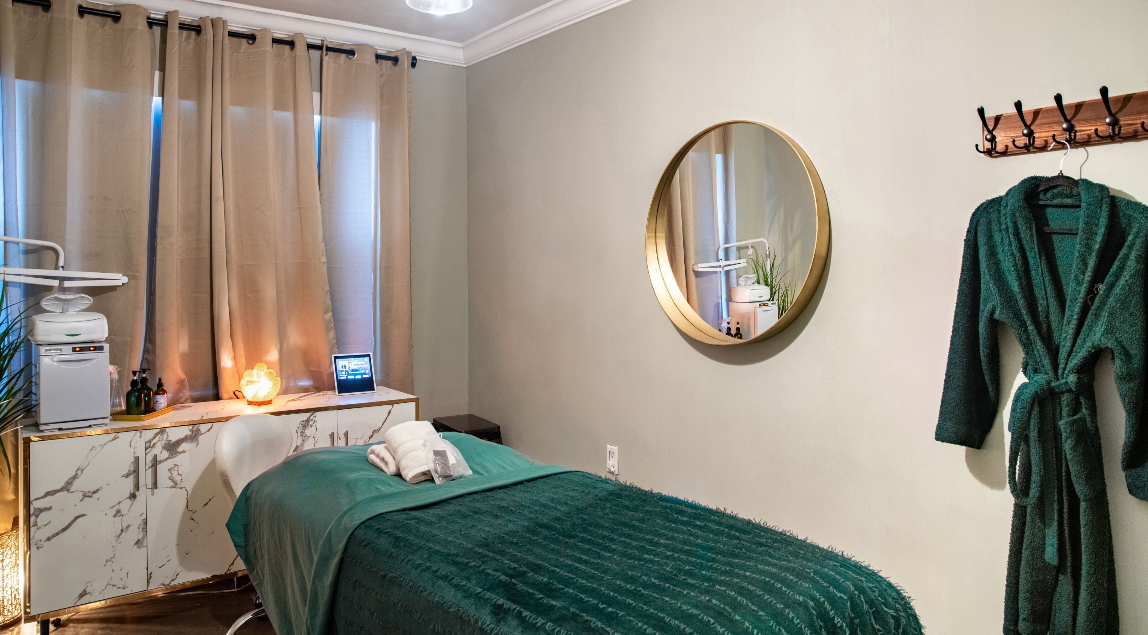 Relaxing spa room at The Shape Spa, Miami Beach, Florida, US with massage bed and calming decor.